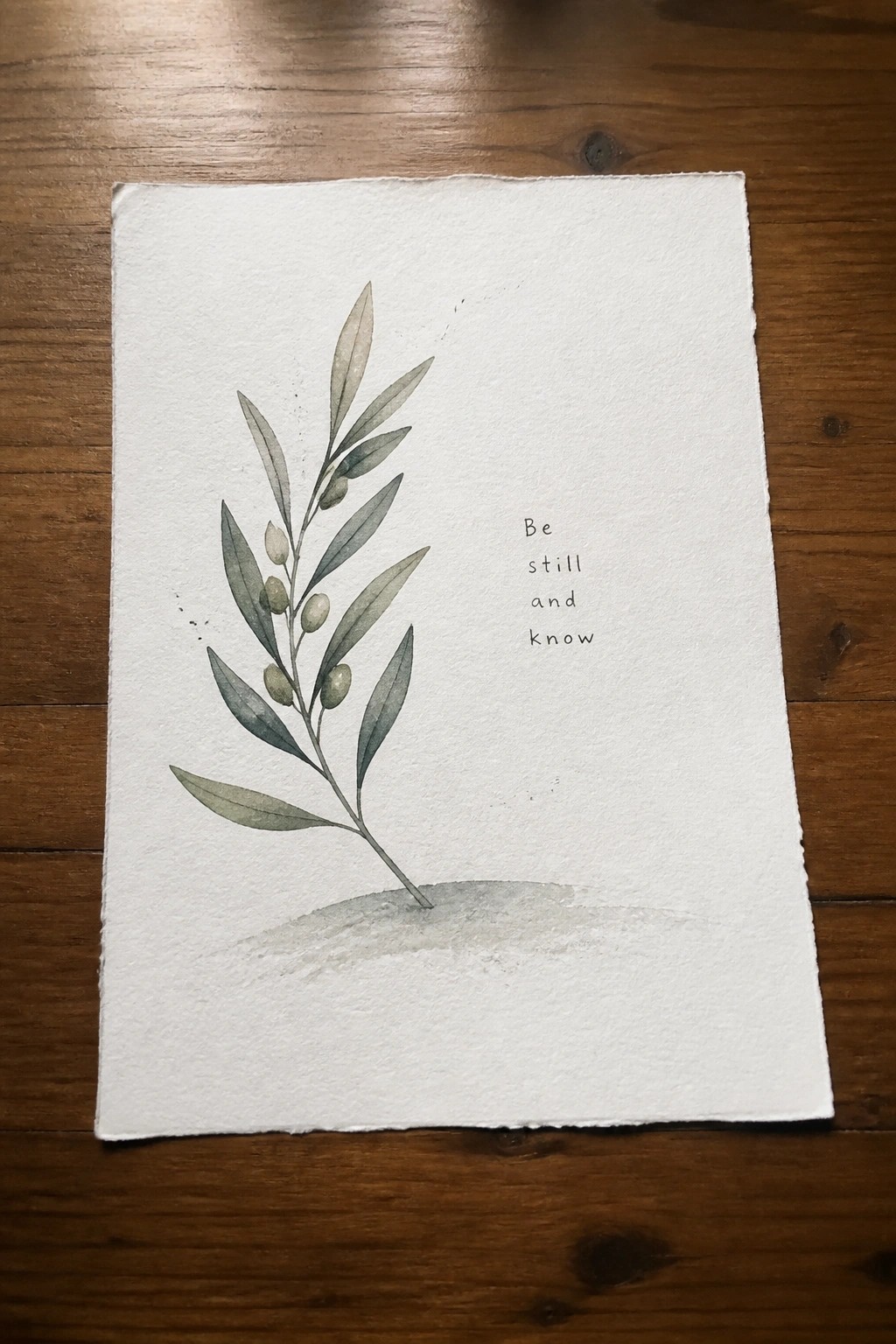 Watercolor olive branch with green leaves and olives beside 