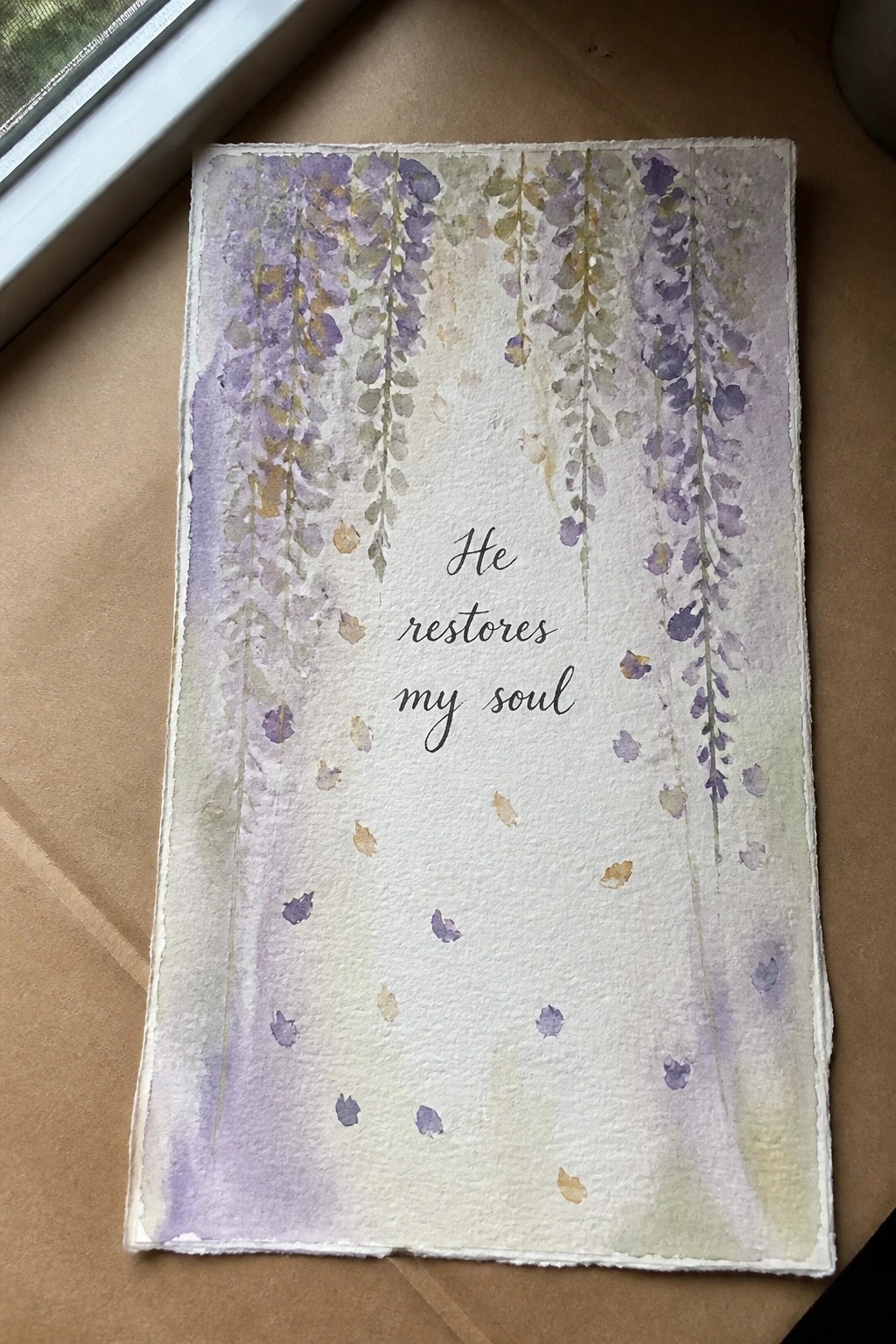 Watercolor card with purple wisteria blooms and cursive text 