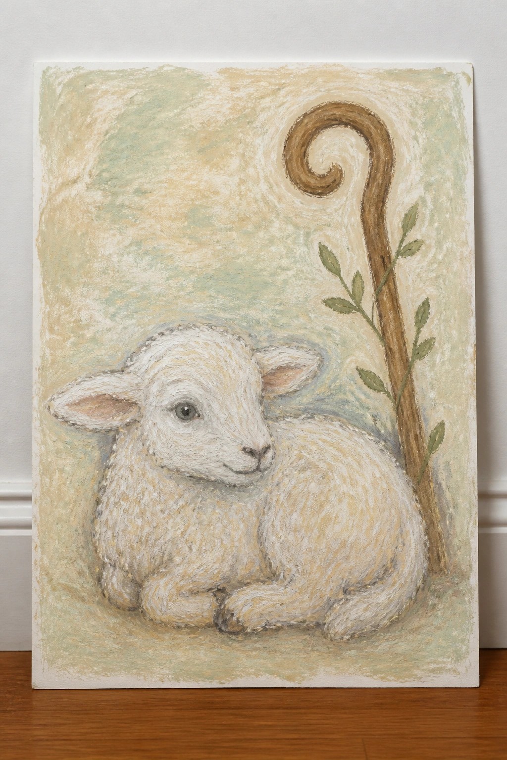 White lamb curled beside spiraled wooden staff with green leaves on pastel background