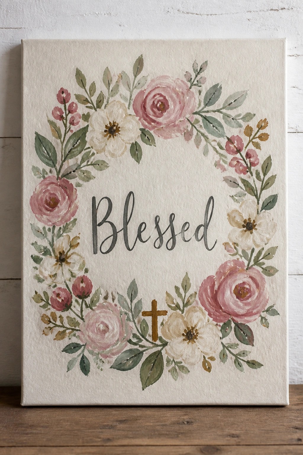 Floral wreath of pink roses and white blooms encircling