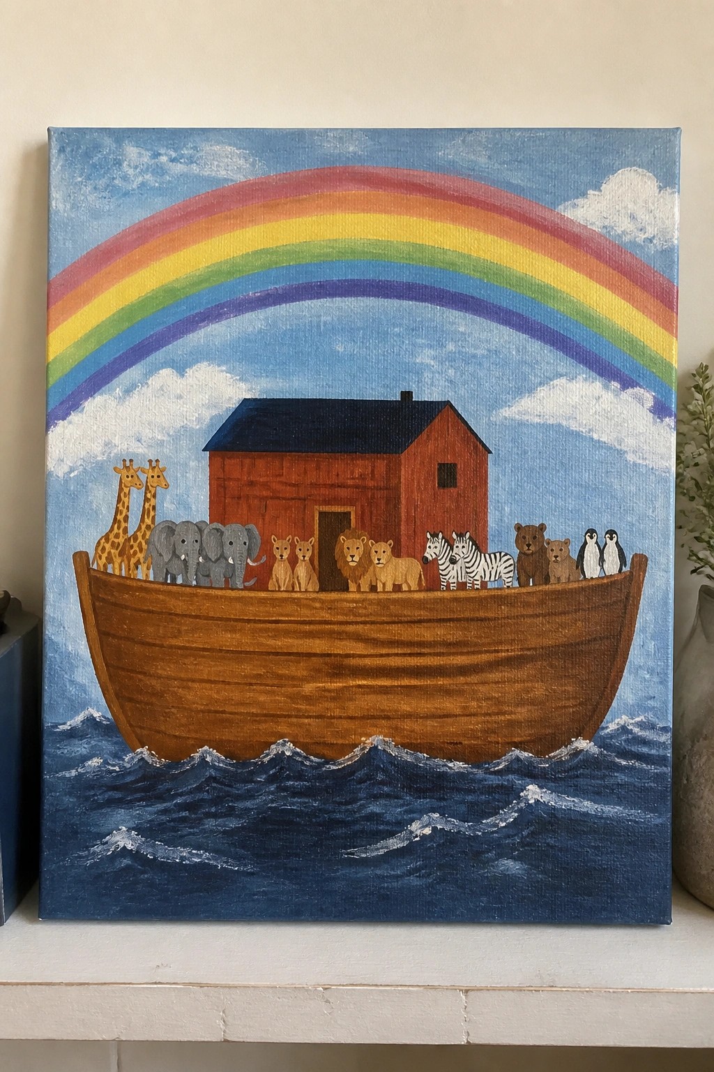 Vibrant rainbow over wooden ark with giraffes, elephants, lions, zebras, bears and penguins on blue waves.