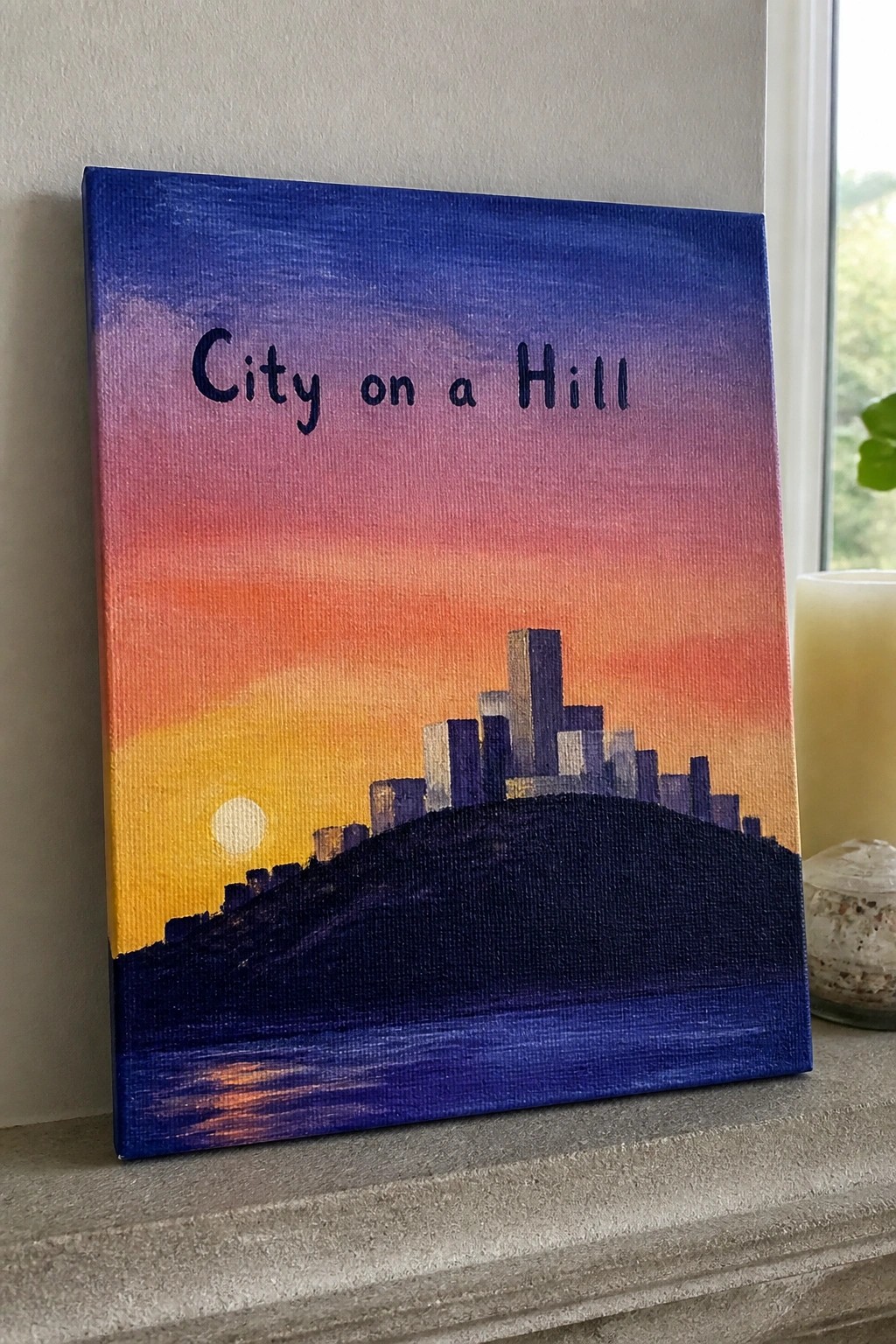 Canvas painting of city skyline on hill under vibrant sunset sky titled 