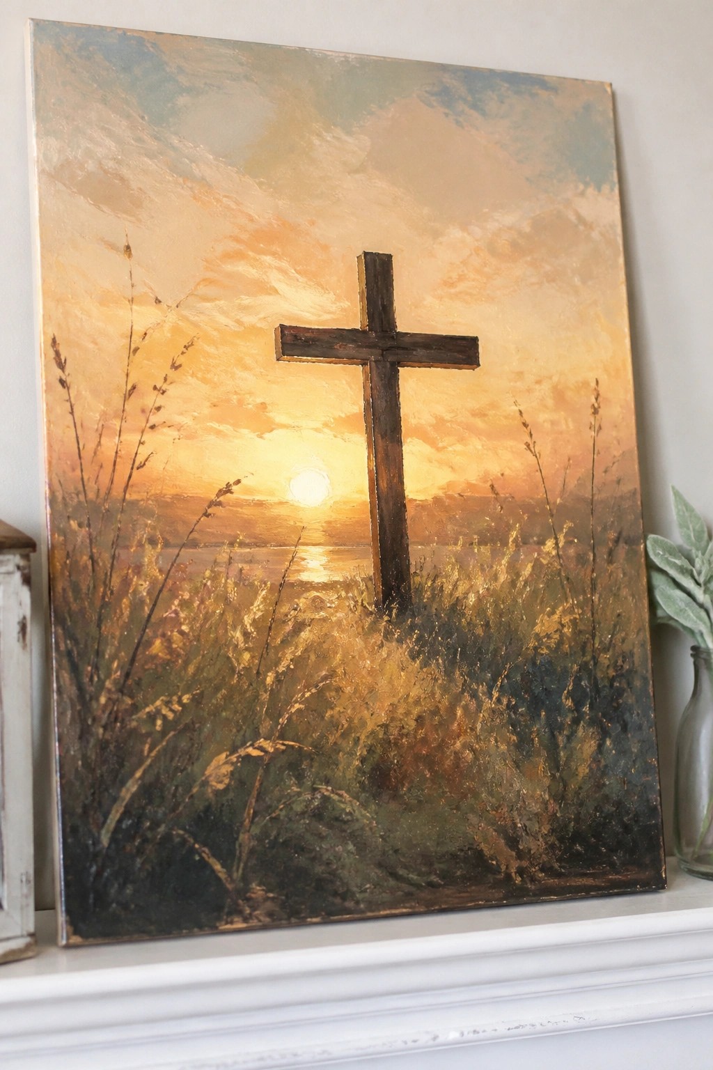 Wooden cross in golden grass under vibrant orange sunset sky with glowing sun.