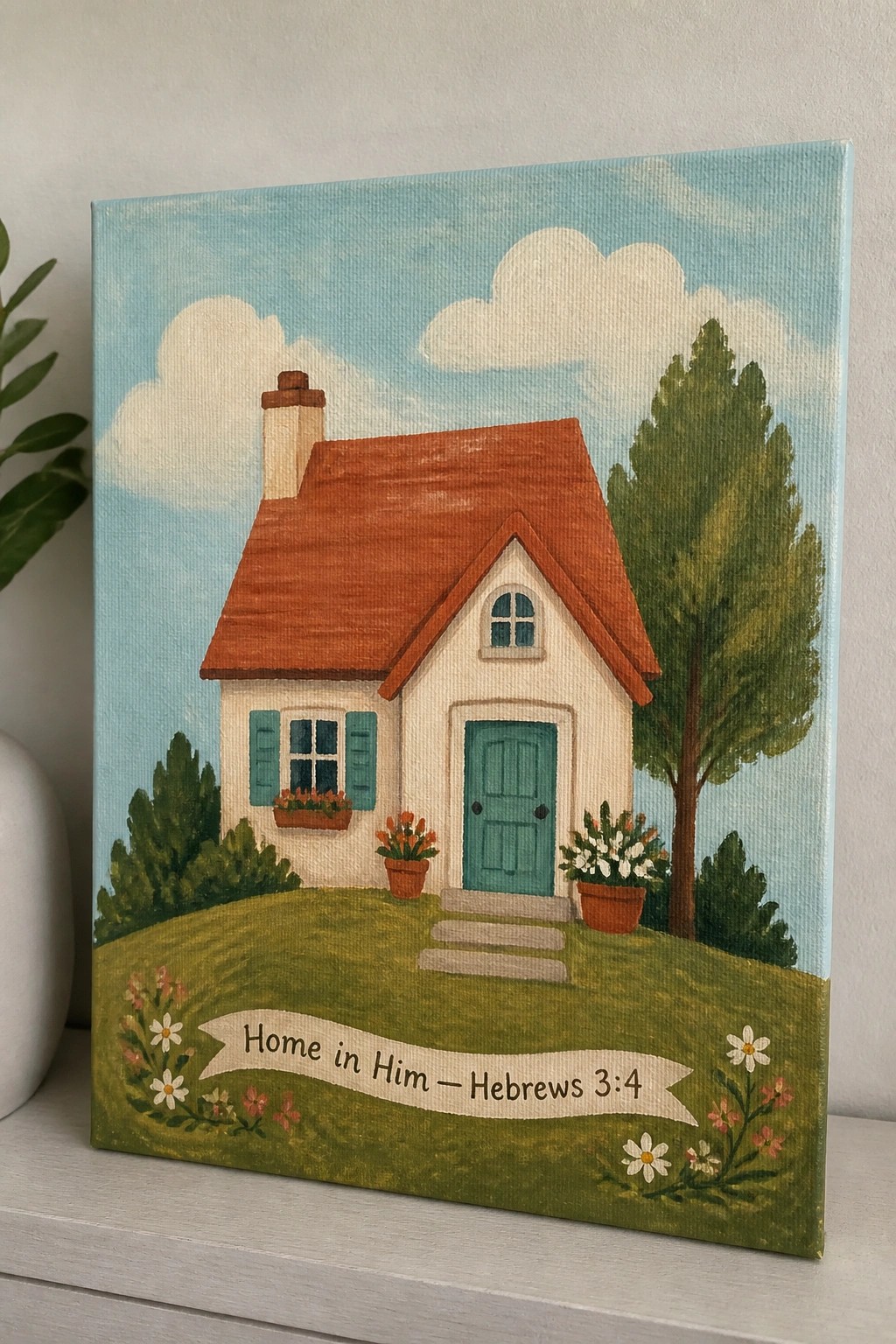 Colorful painting of cottage with red roof, teal door on green hill and sky banner.