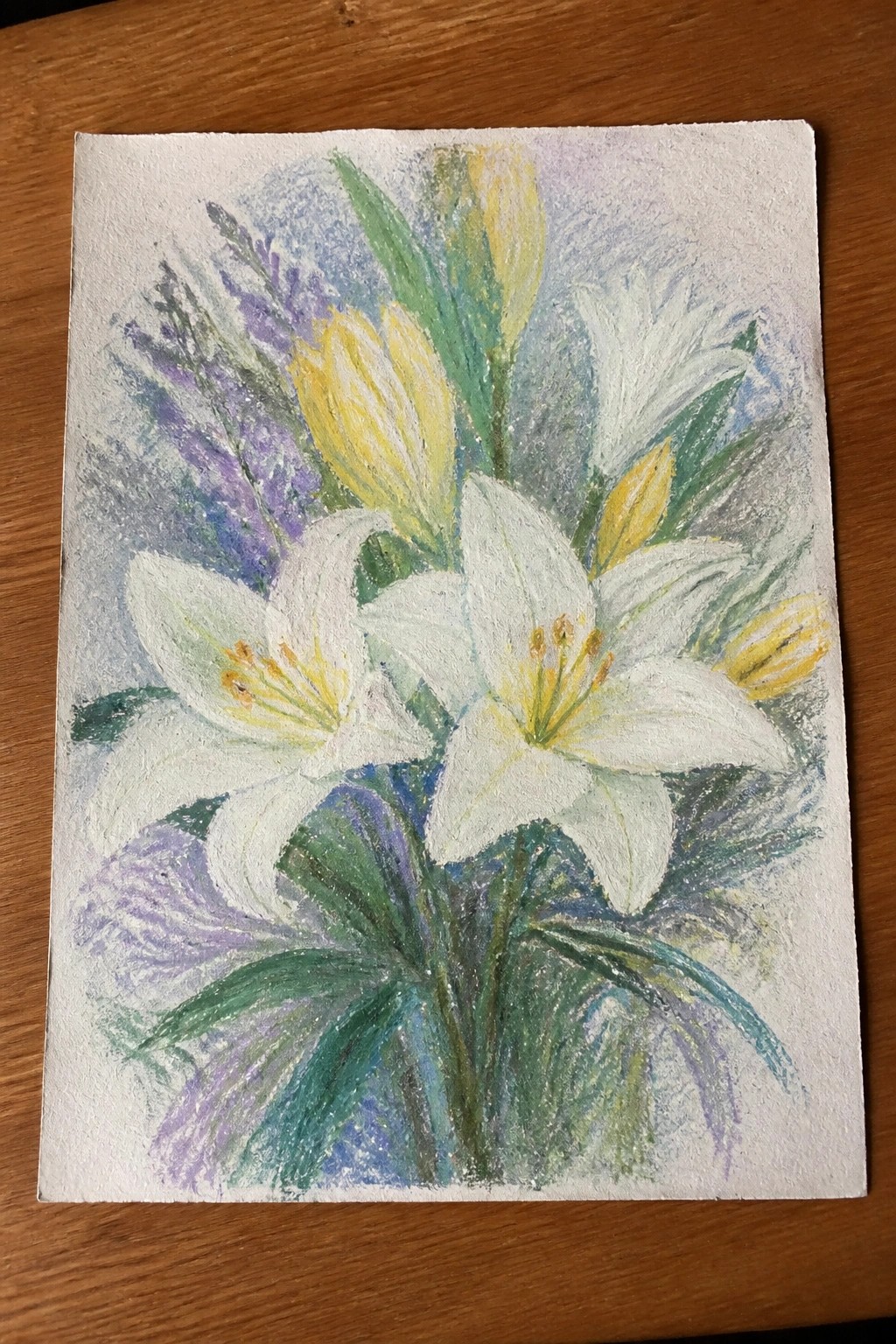 Pastel painting of white lilies with yellow centers, green leaves, and purple accents.