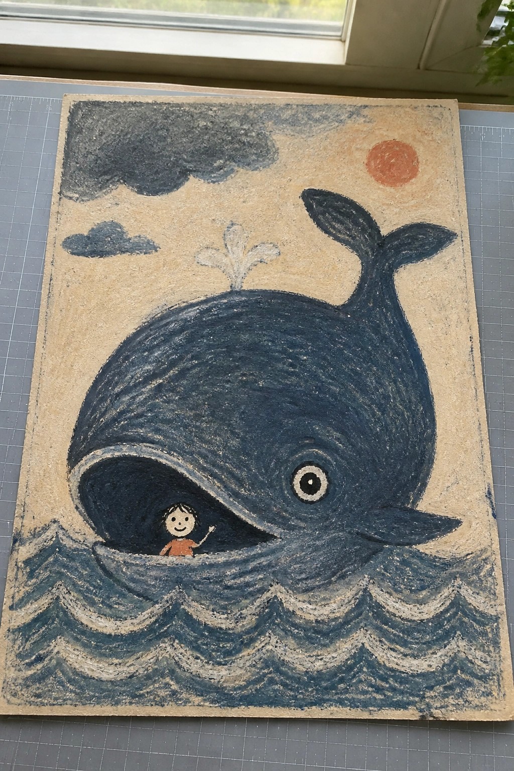 Blue whale with child in orange waving from open mouth above wavy seas.