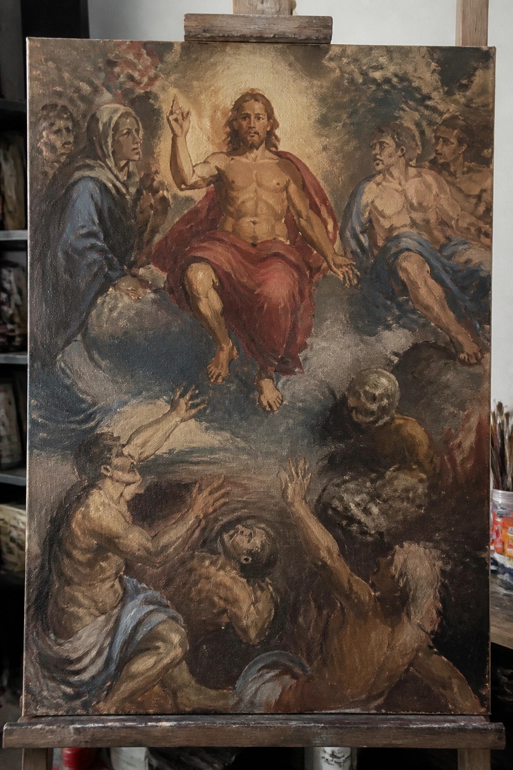 Oil painting of robed Jesus on clouds gesturing amid figures, tormented souls reaching from below.