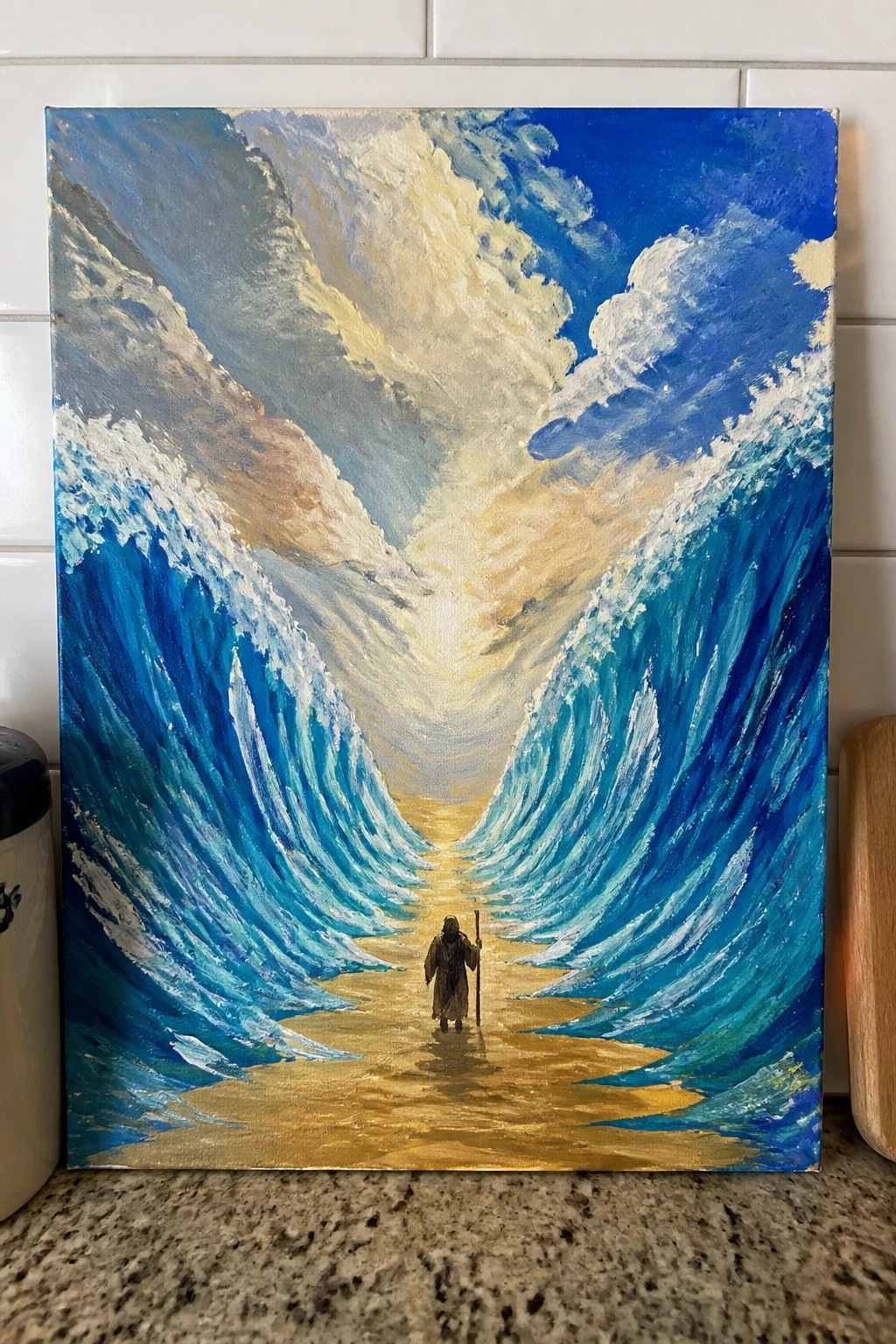 Oil painting of robed figure with staff walking between towering blue waves.