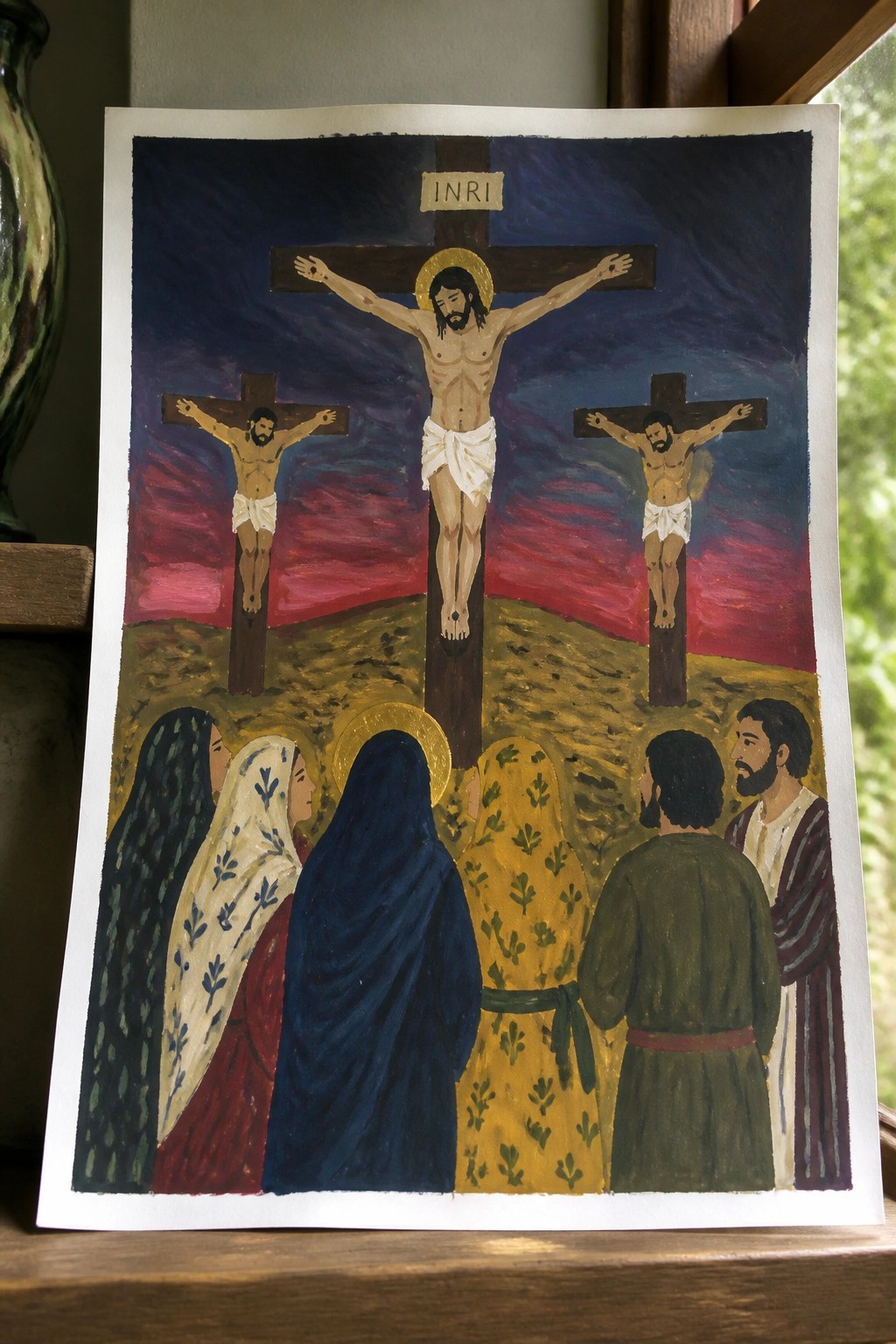 Crucifixion painting with central Jesus on cross, two thieves, and robed mourners below.