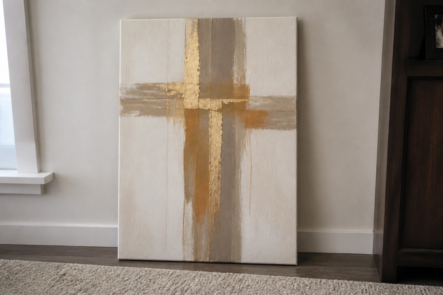 Abstract cross painting in gold, beige, and cream tones with gold leaf accents