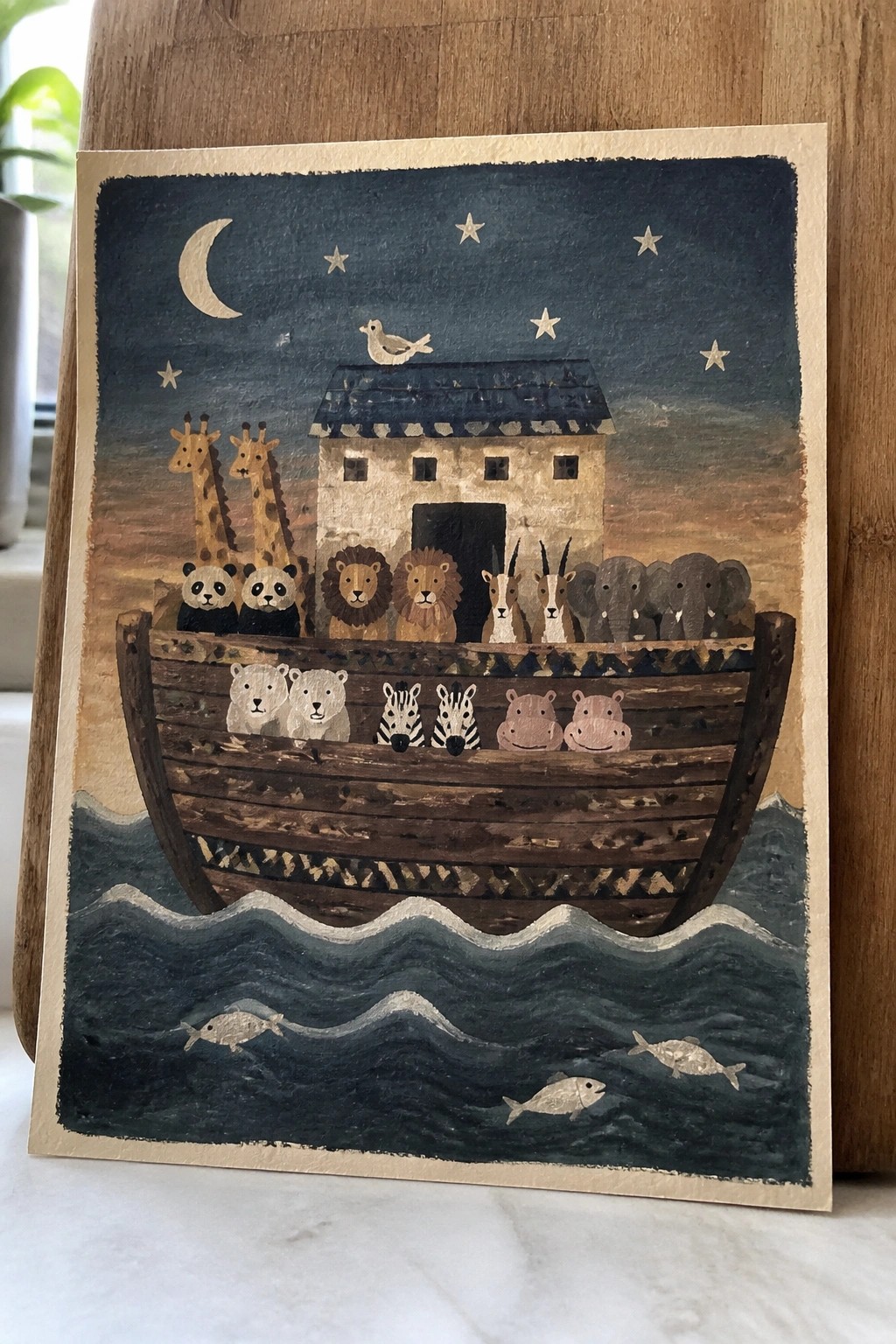 Wooden ark with giraffes, lions, zebras and other animals under moon and stars.
