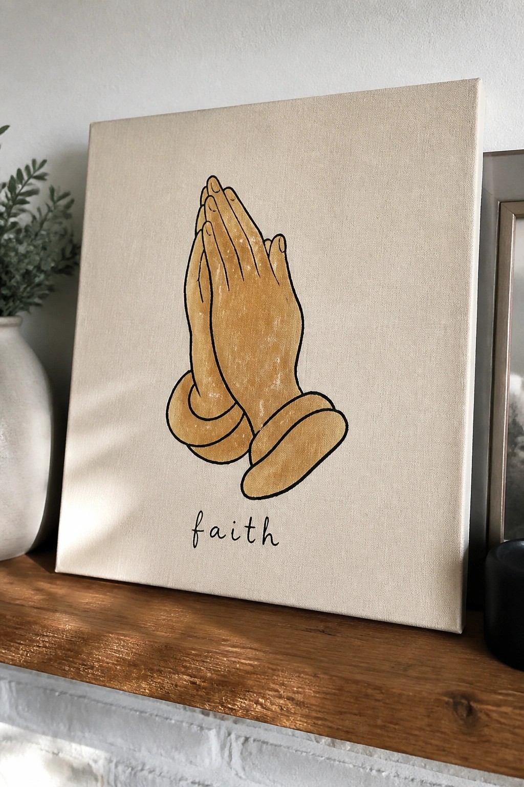 Tan praying hands painting with 