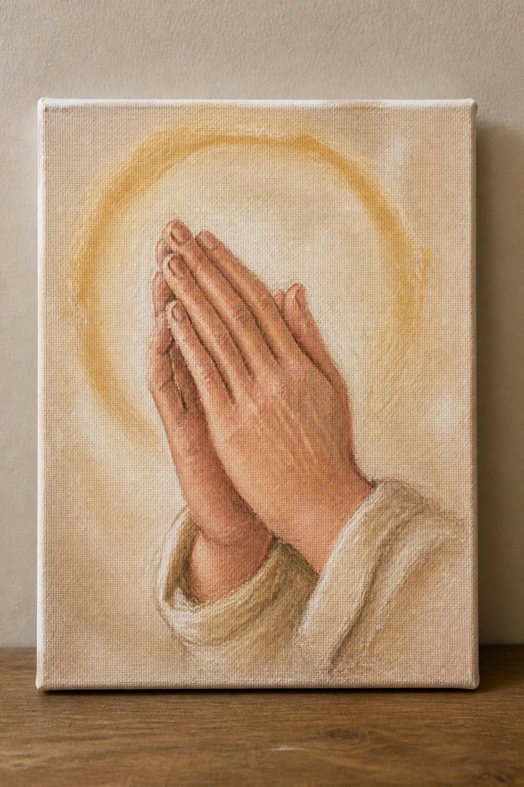 Clasped praying hands with glowing halo from light sleeve on canvas.