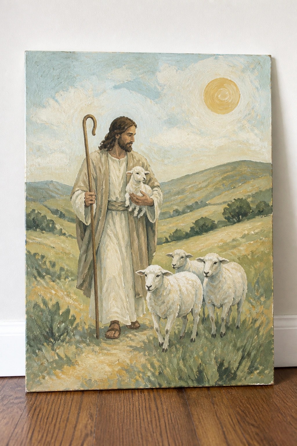 Bearded man in white robes holds lamb and staff as sheep walk in sunny hills