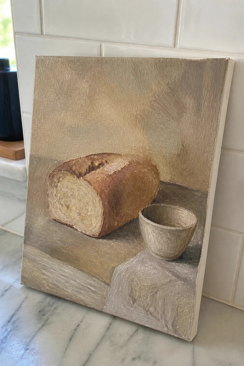 Still life painting of sliced bread loaf beside small bowl on neutral surface