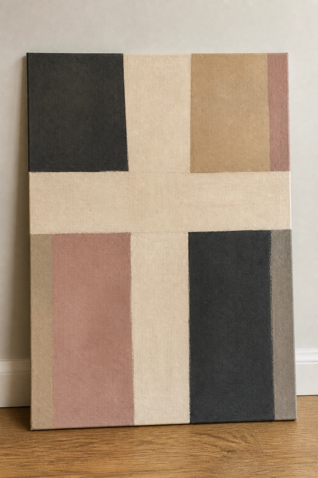 Abstract geometric painting with beige cross and muted gray, pink, brown blocks on canvas
