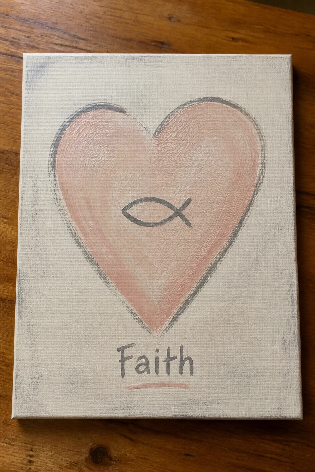 Pink heart with fish symbol and 