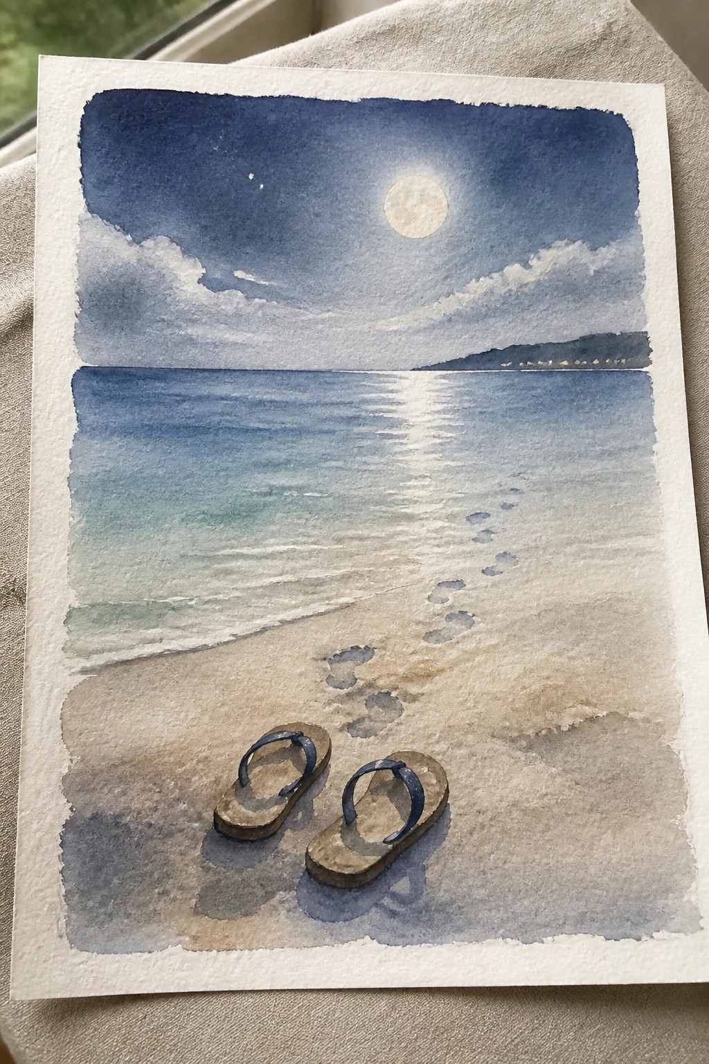 Watercolor of moonlit beach with footprints in sand and pair of flip-flops