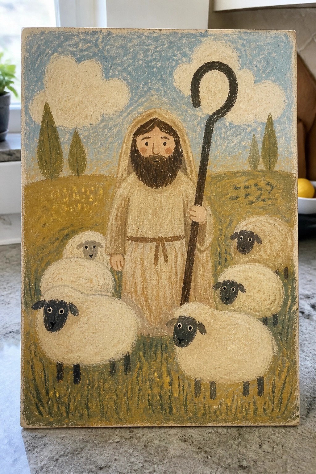 Bearded man in beige robe with halo holds staff among sheep in golden hills