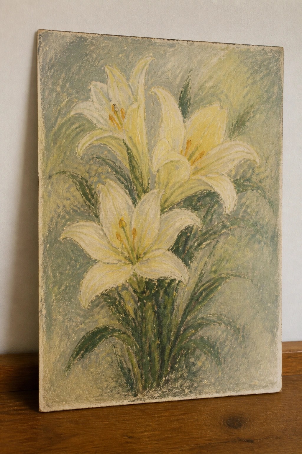 Impressionistic painting of white lilies with yellow centers and green leaves on canvas