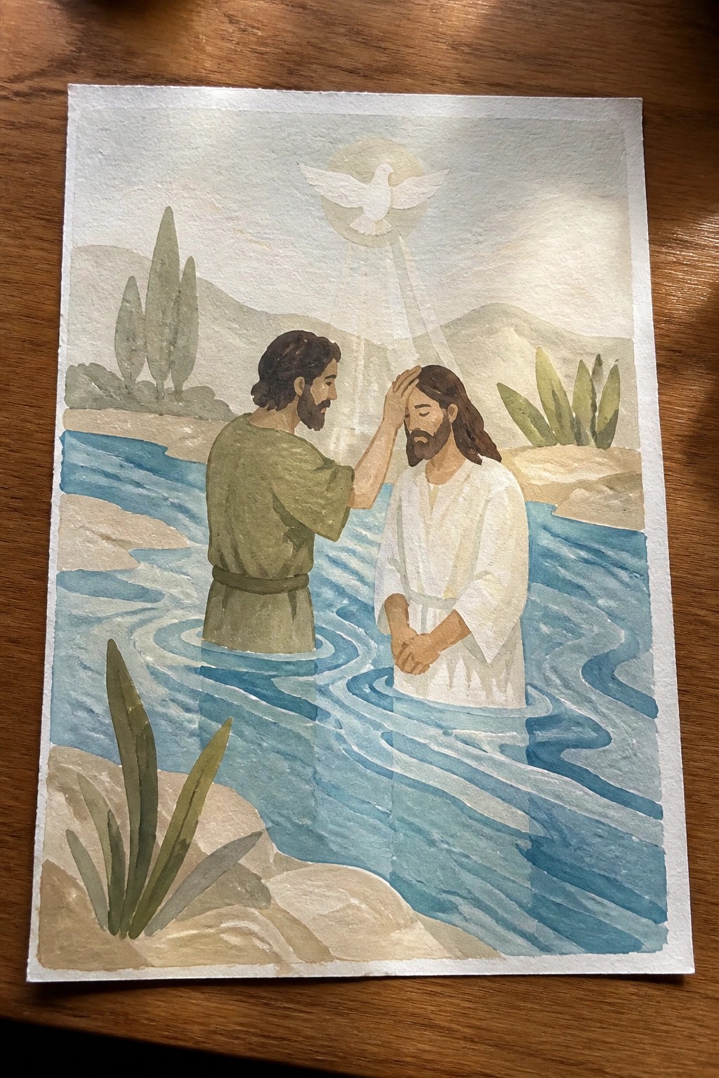 Watercolor of baptism: man in green tunic baptizes man in white robe in blue river under dove.