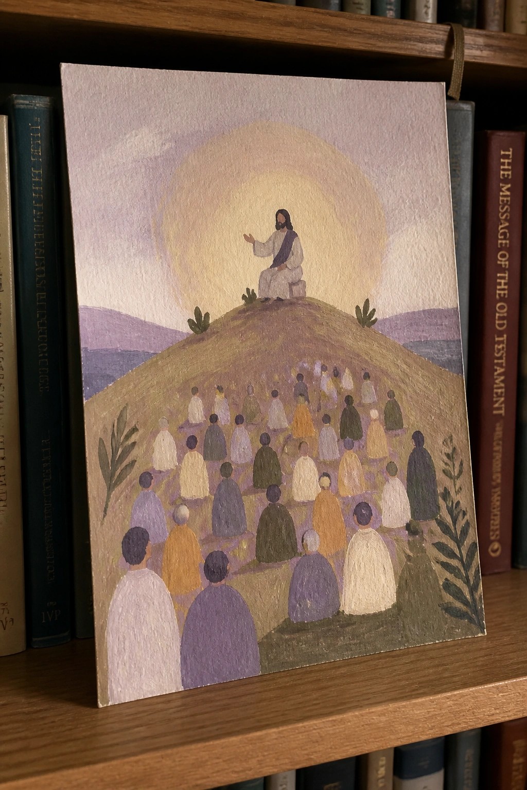 Pastel folk painting shows robed Jesus teaching seated crowd on grassy hillside among books.