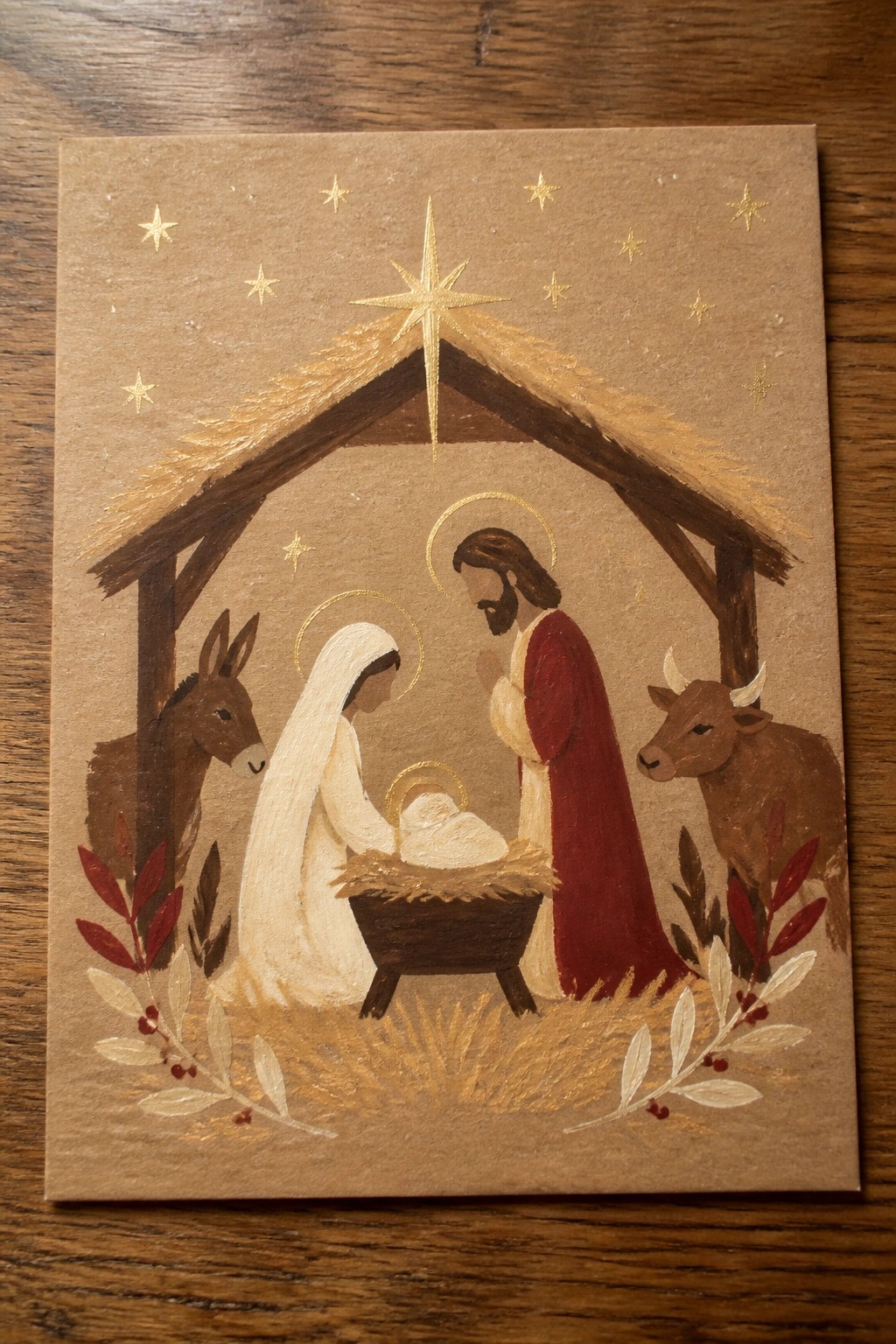 Rustic painting of nativity with Mary in white, Joseph in red, animals, and golden star.
