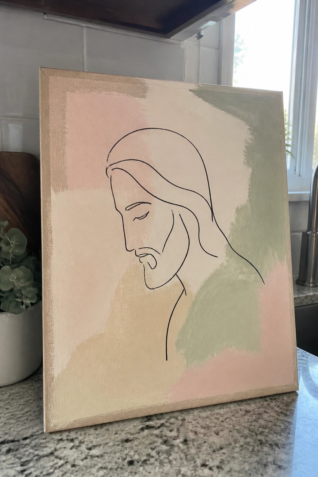 A canvas shows a black line drawing of Jesus in profile over soft pink, beige, and green brushstrokes.