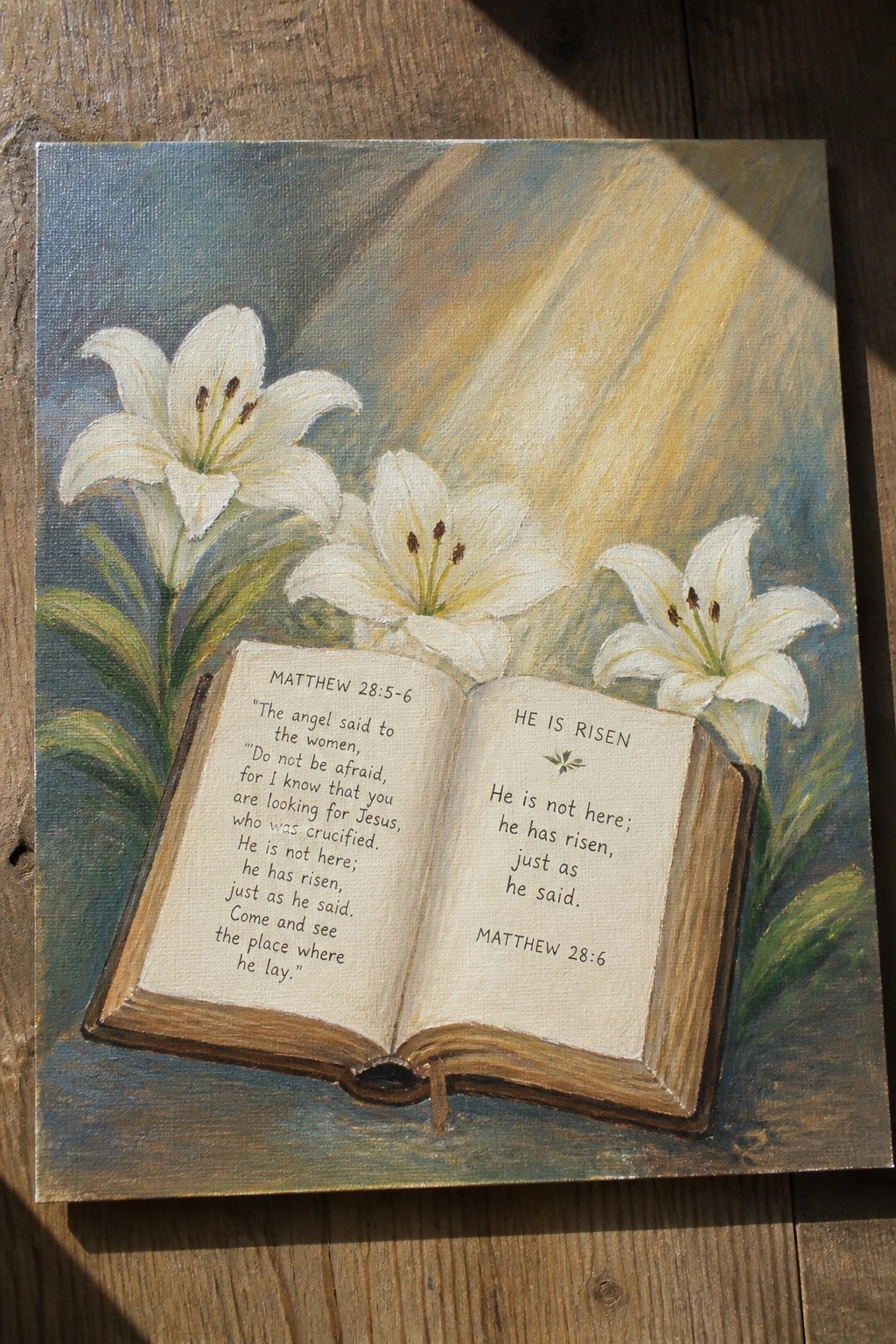 Open Bible with white lilies under golden sunlight rays in painted scene
