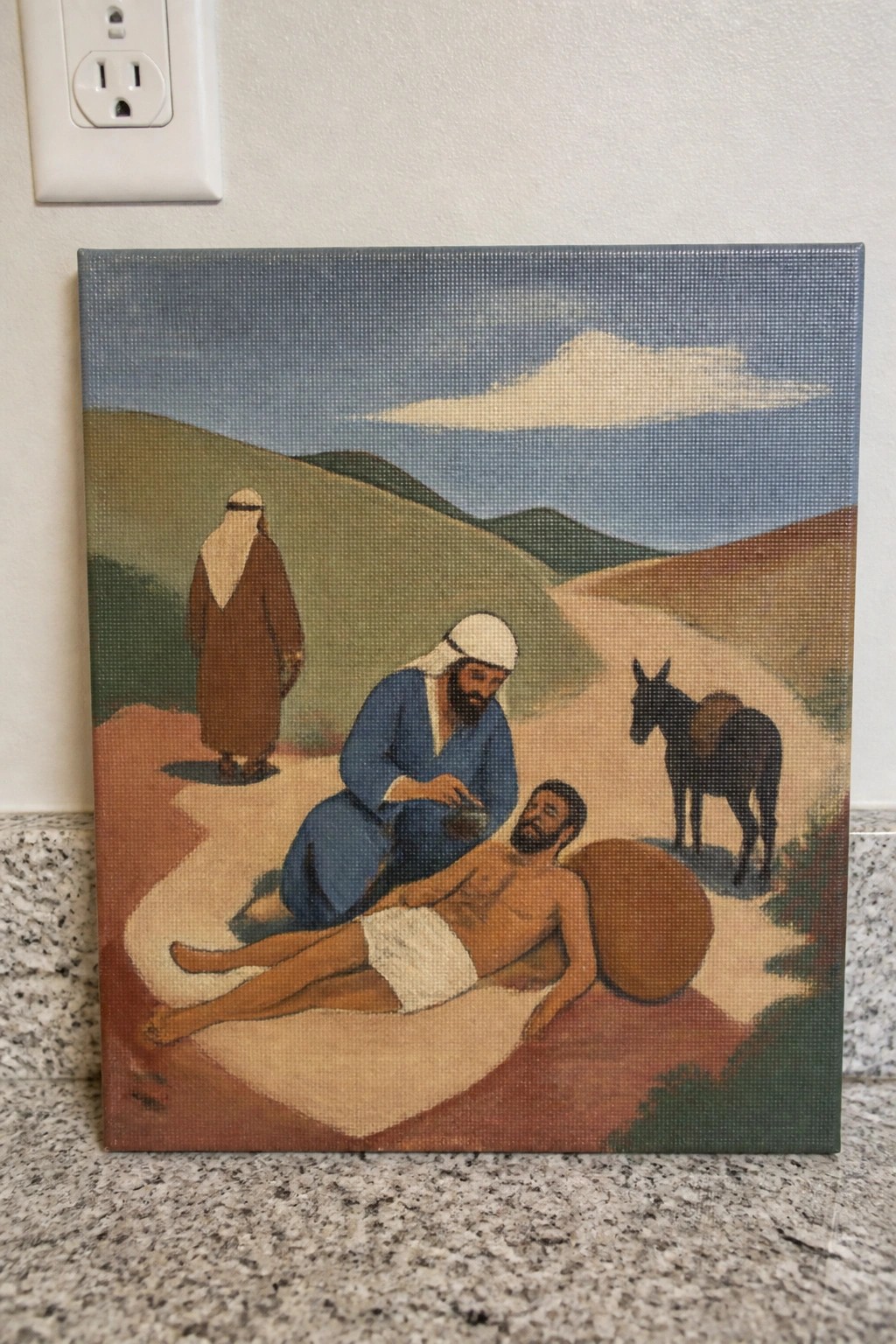 Painting of Good Samaritan in blue robe aiding injured man near donkey on hilly path