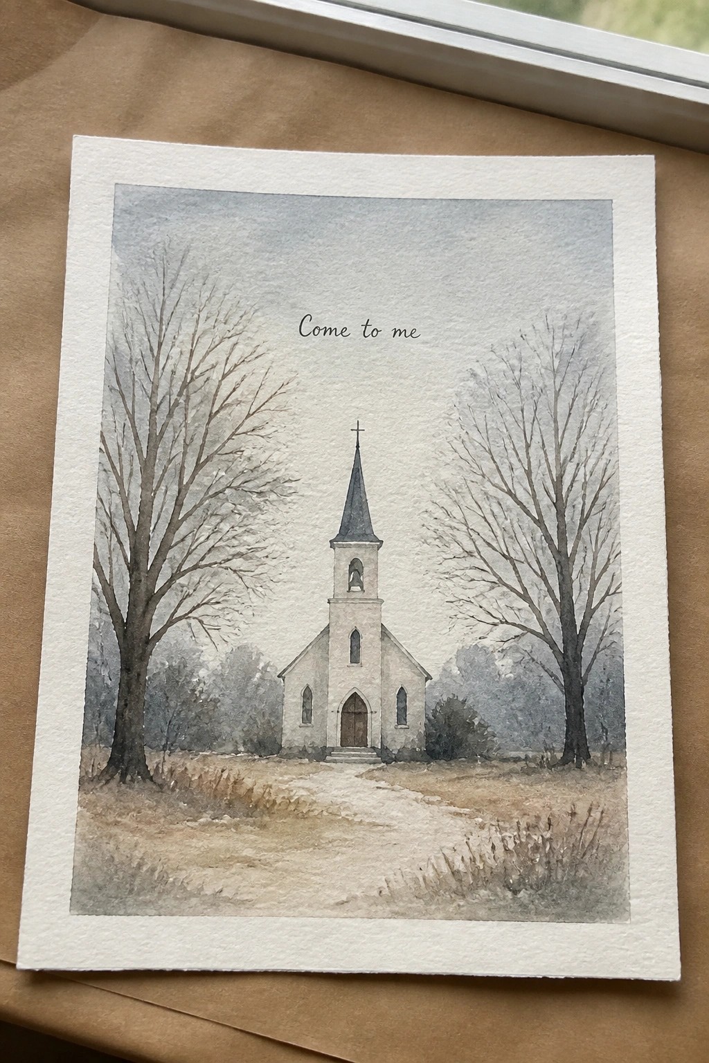 Watercolor of white church with steeple between bare trees, path, and 
