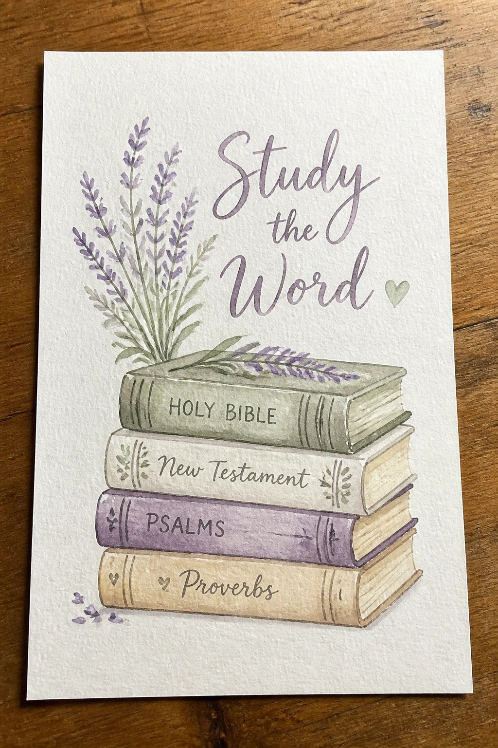 Watercolor of stacked Bible books with lavender and 