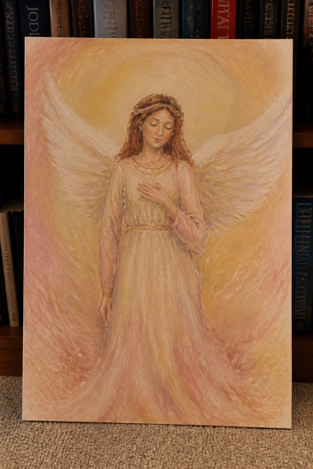 Serene angel with large white wings in flowing dress, hand on chest, golden glow.