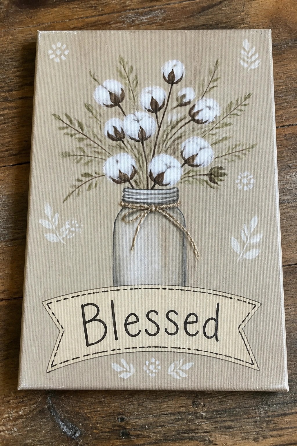 Rustic beige canvas painting of cotton stems in mason jar with Blessed banner