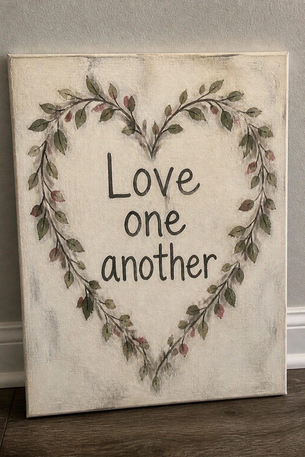 Canvas with heart wreath of green leaves and 