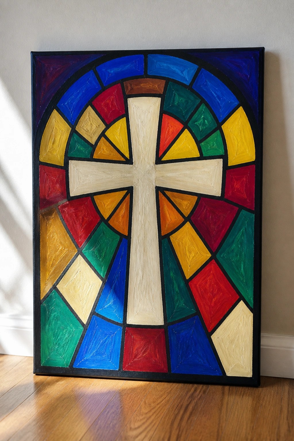 Arched colorful stained glass painting with central white cross on canvas.