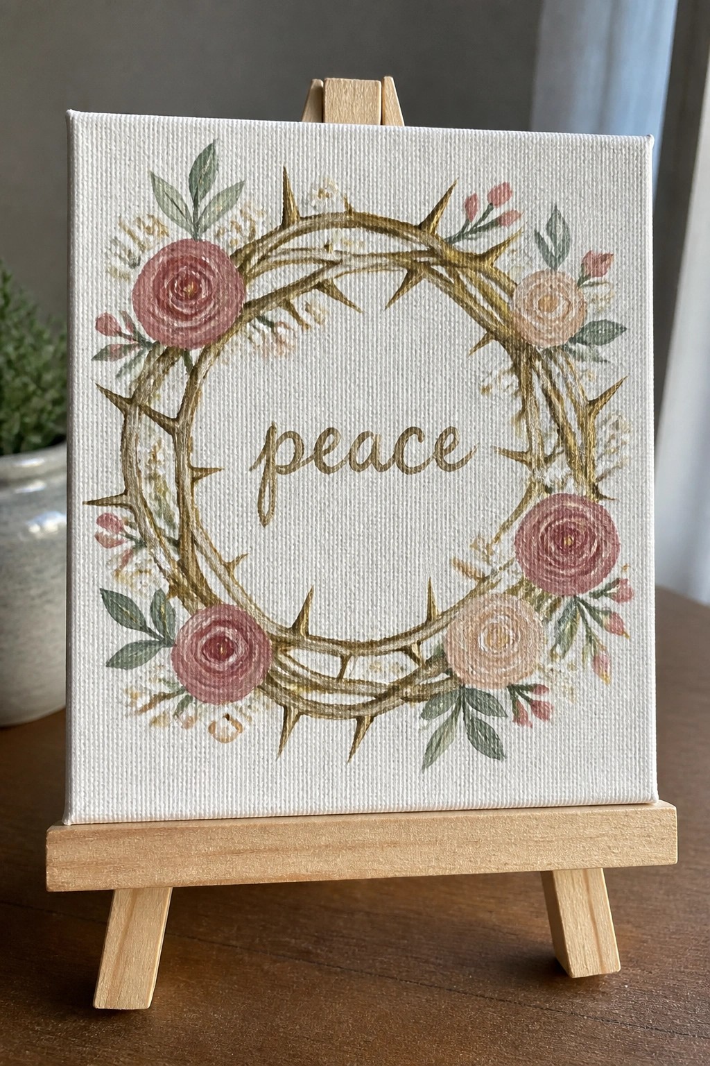 Canvas on wooden easel with floral thorn wreath and 