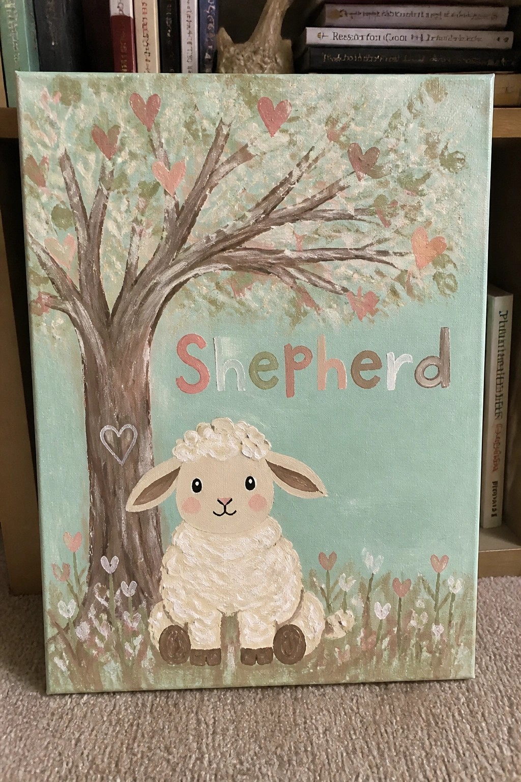 Pastel canvas painting of a tree with pink hearts, cute sheep, and 