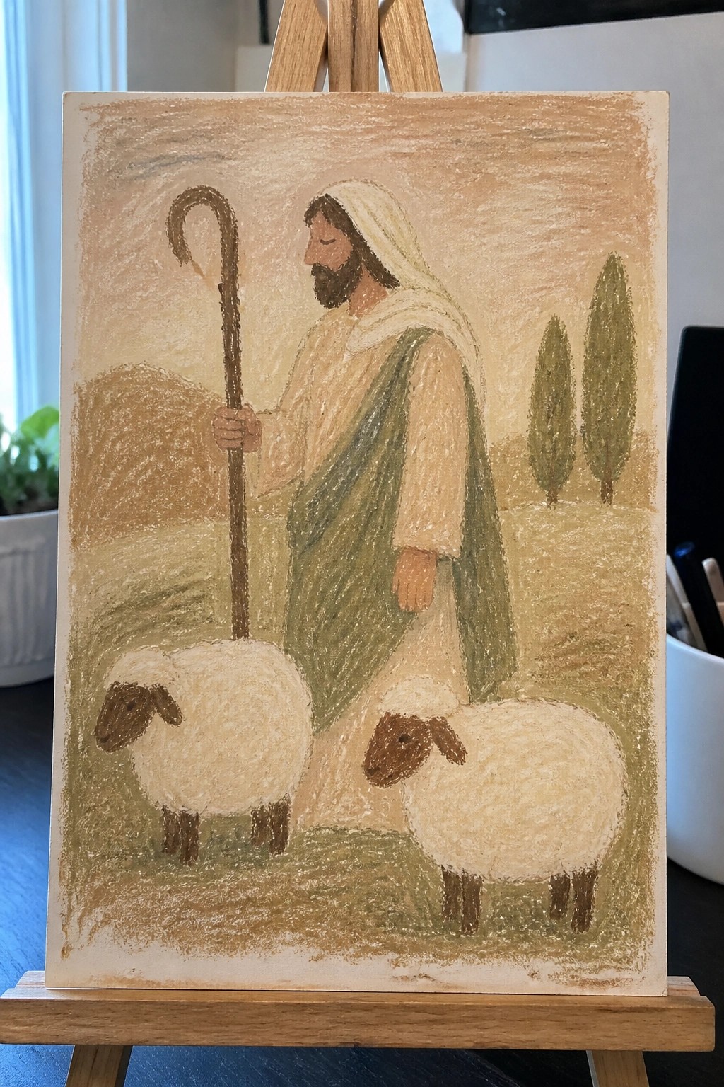 Bearded shepherd in beige robe and green cloak with staff beside two sheep in field