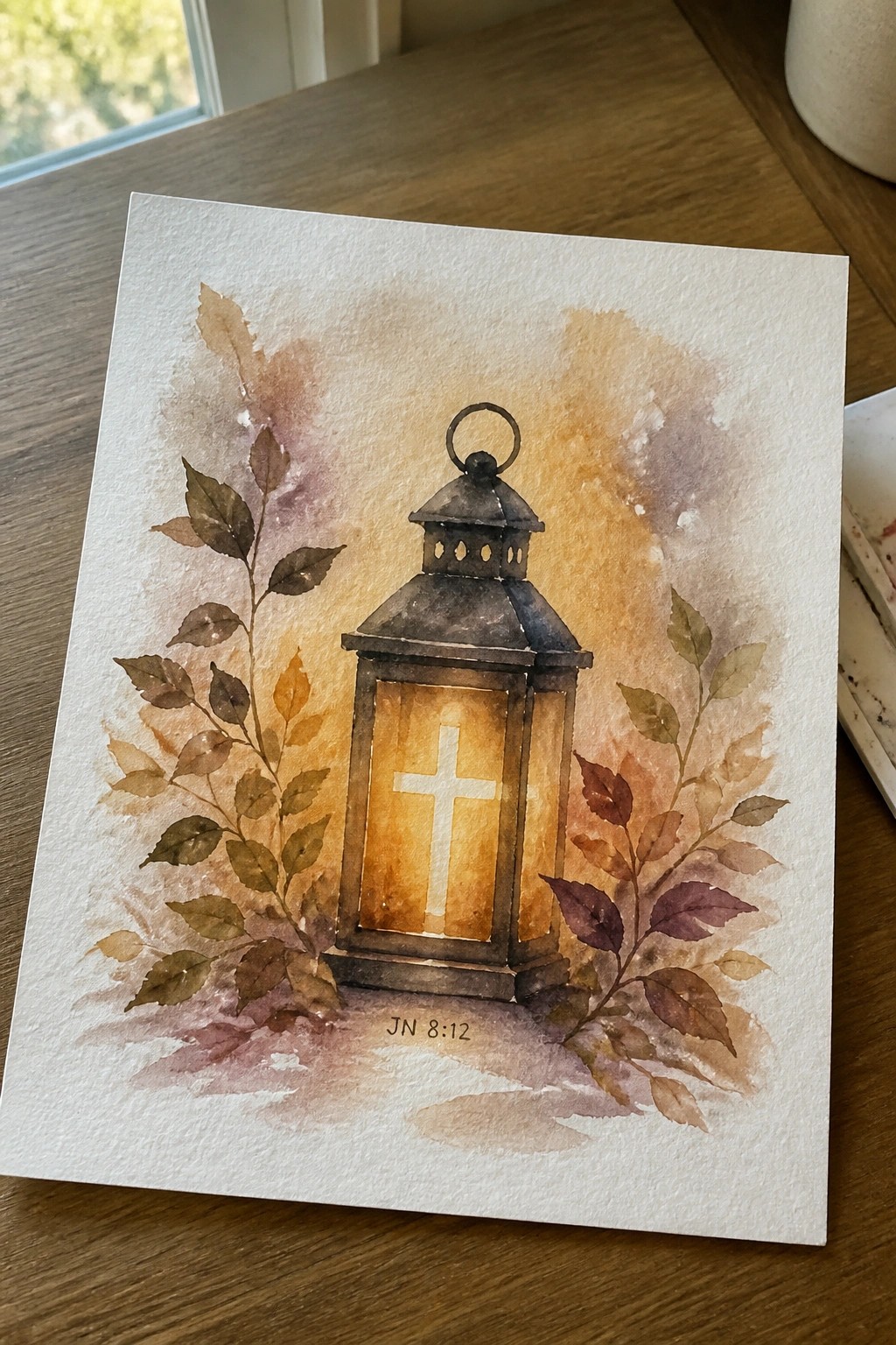 Watercolor of dark lantern with glowing cross, surrounded by autumn leaves and warm washes