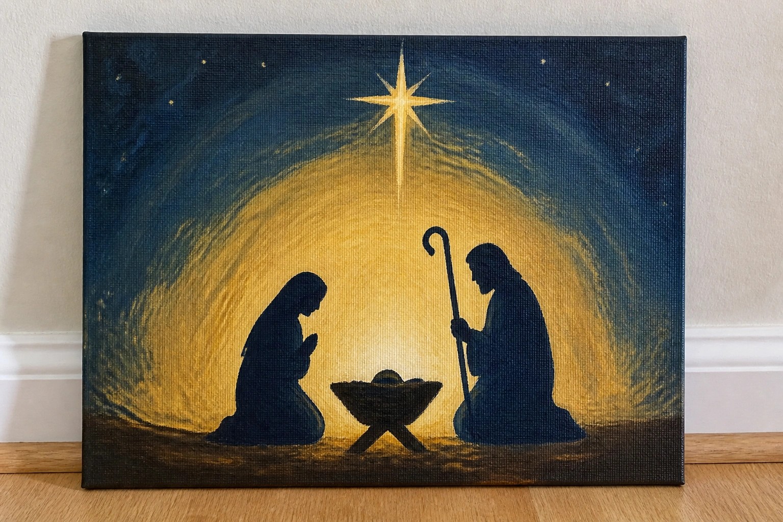 Blue-robed Mary and Joseph kneel praying beside manger under golden star in painting