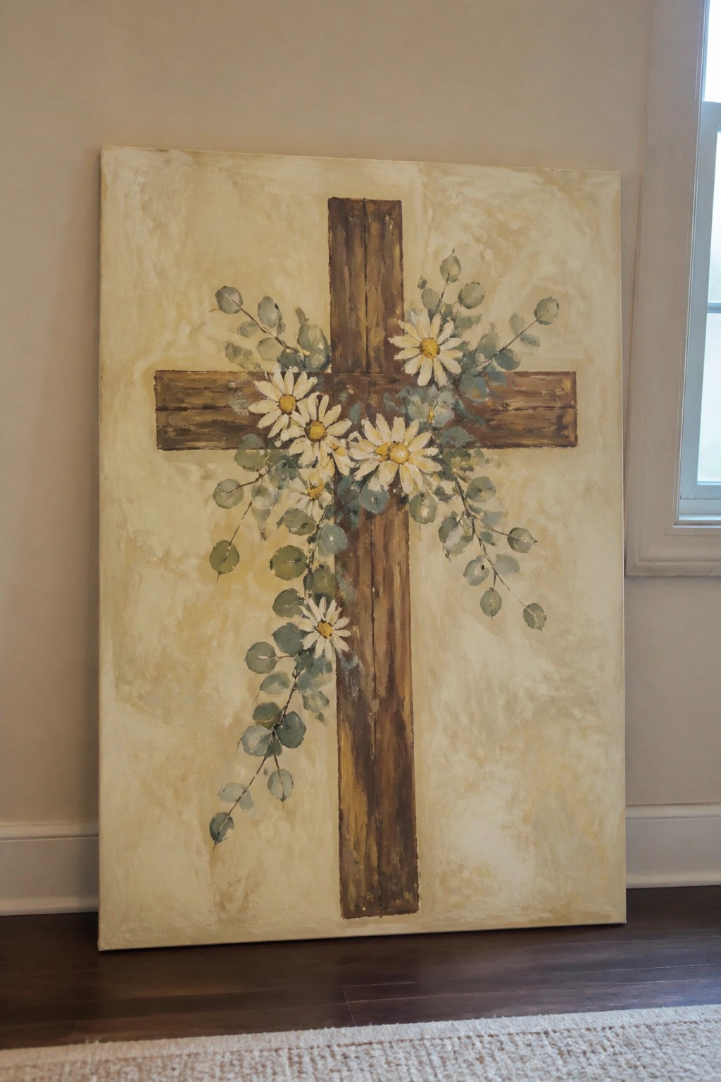 Rustic wooden cross with white daisies and green eucalyptus on textured beige canvas