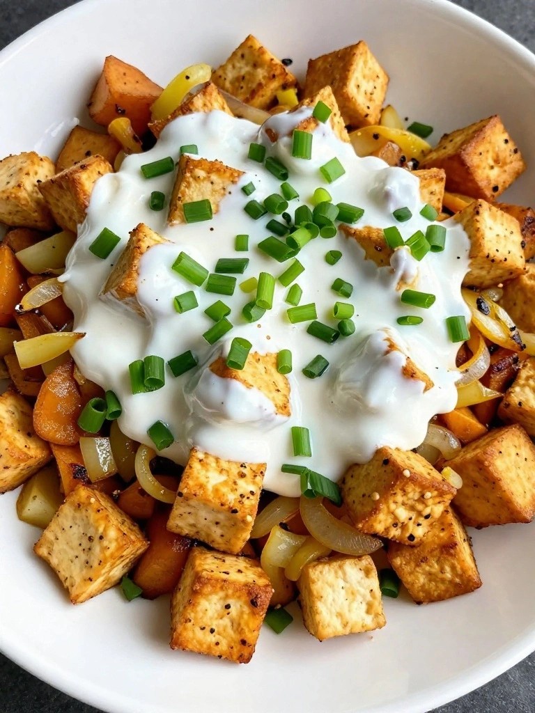 Crispy Baked Tofu Hash with Sweet Potatoes and Garlic Yogurt Drizzle