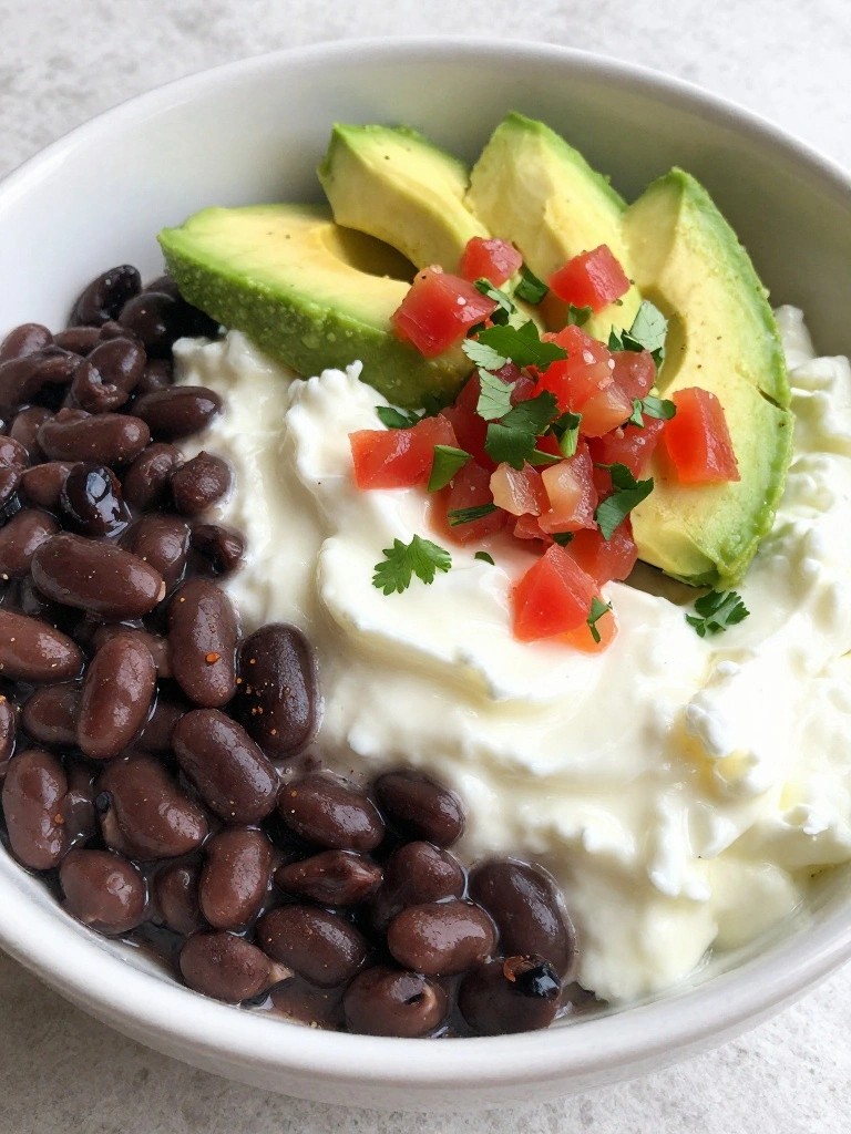 Mexican-Style Cottage Cheese Breakfast Bowl with Black Beans, Avocado, Salsa, and Cilantro