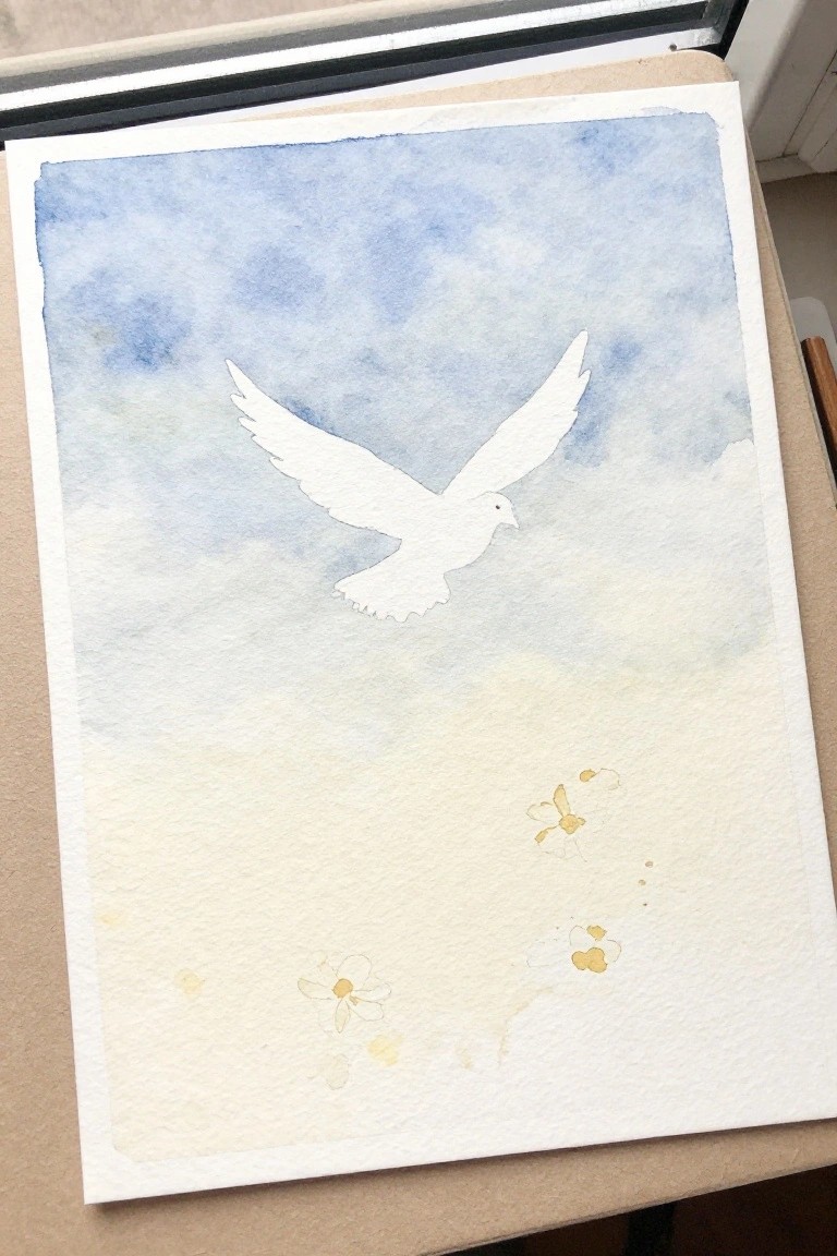 Watercolor of white dove in flight against blue cloudy sky with small yellow flowers below.