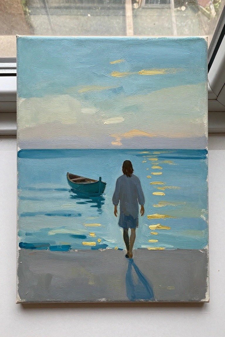 Person in blue walking on beach toward boat on calm sea with golden reflections