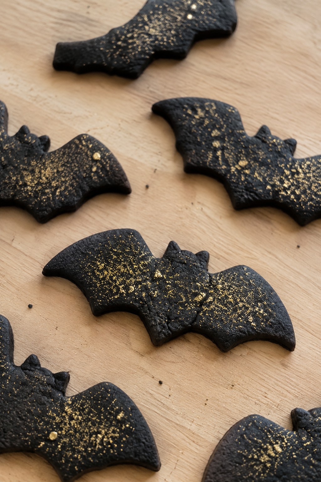 Black Cocoa Bat Cookies with Edible Gold Glitter