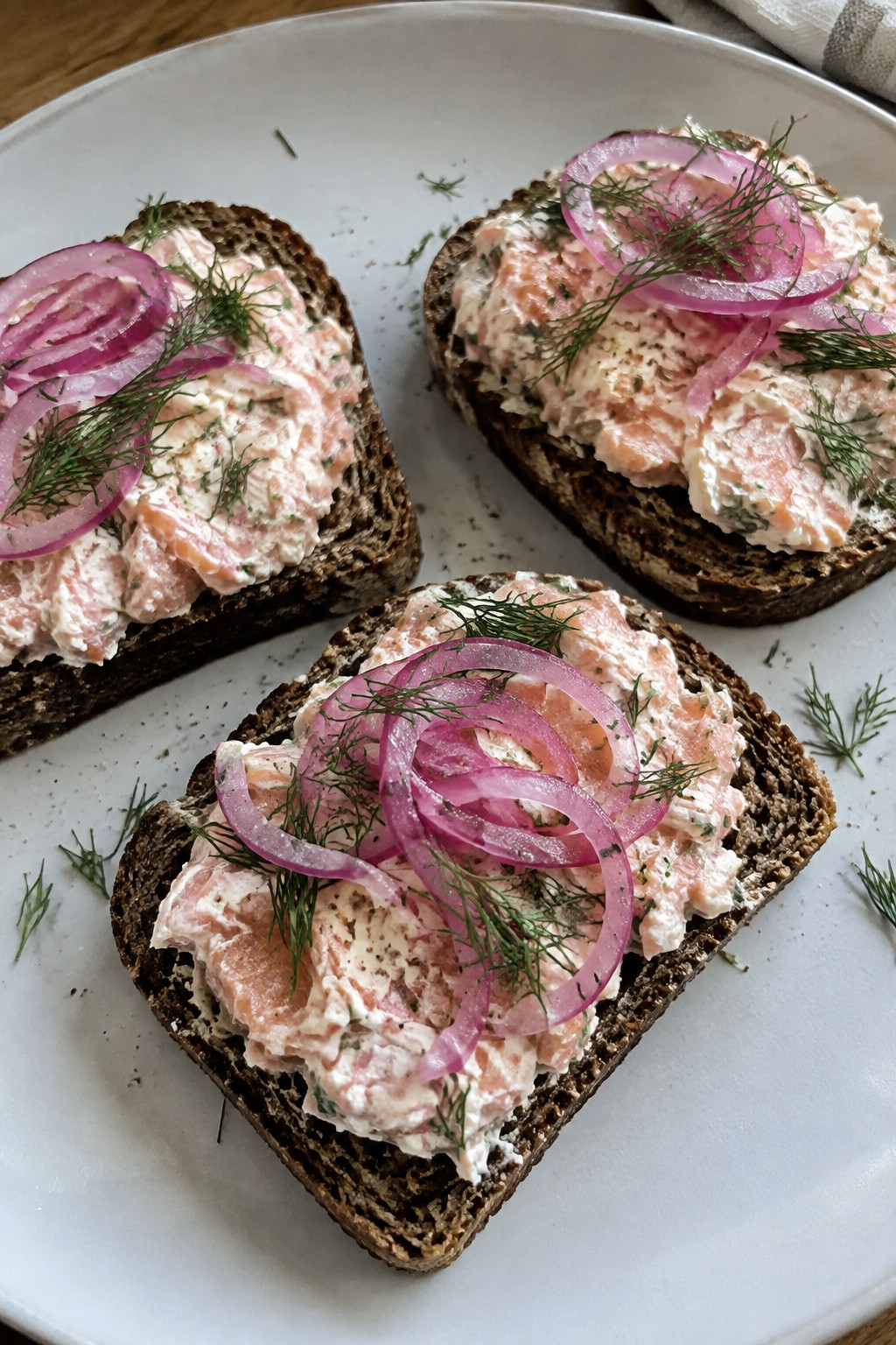 Smoked Salmon Rillettes on Rye with Pickled Red Onion and Dill