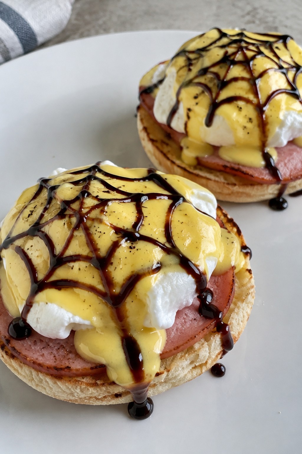 Spiderweb Eggs Benedict on English Muffins