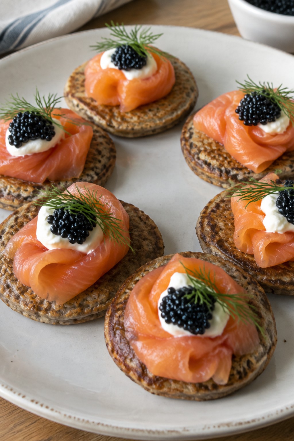 Smoked Salmon Rosettes on Buckwheat Blini with Caviar